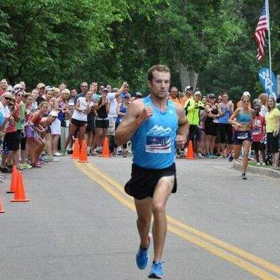 Runners finishing the FireKracker 5k elite race.